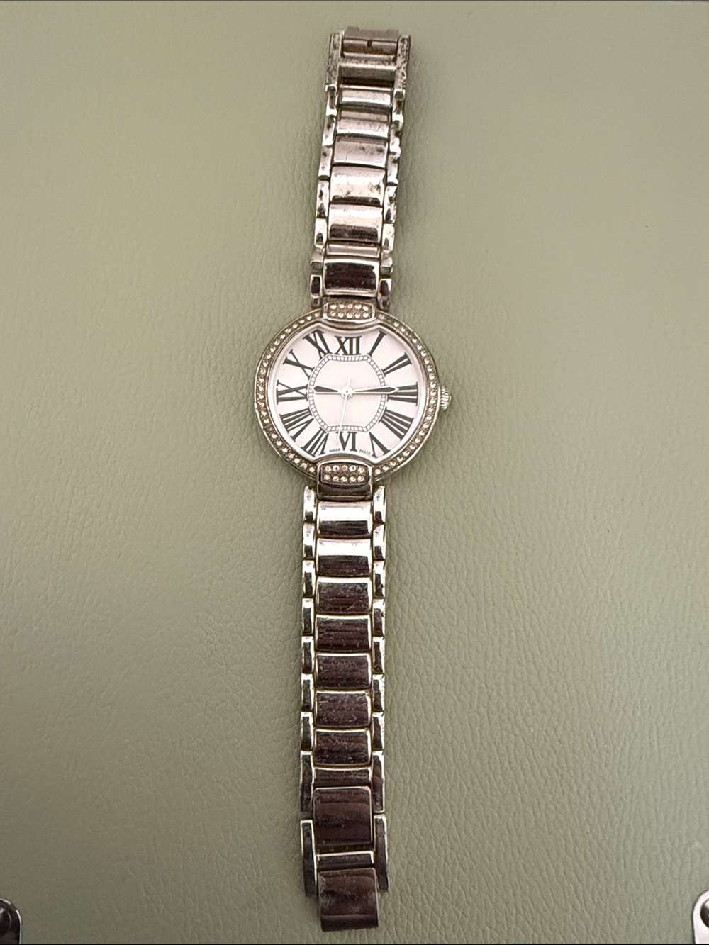 Classic Silver Women’s Bracelet Watch with Roman Dial